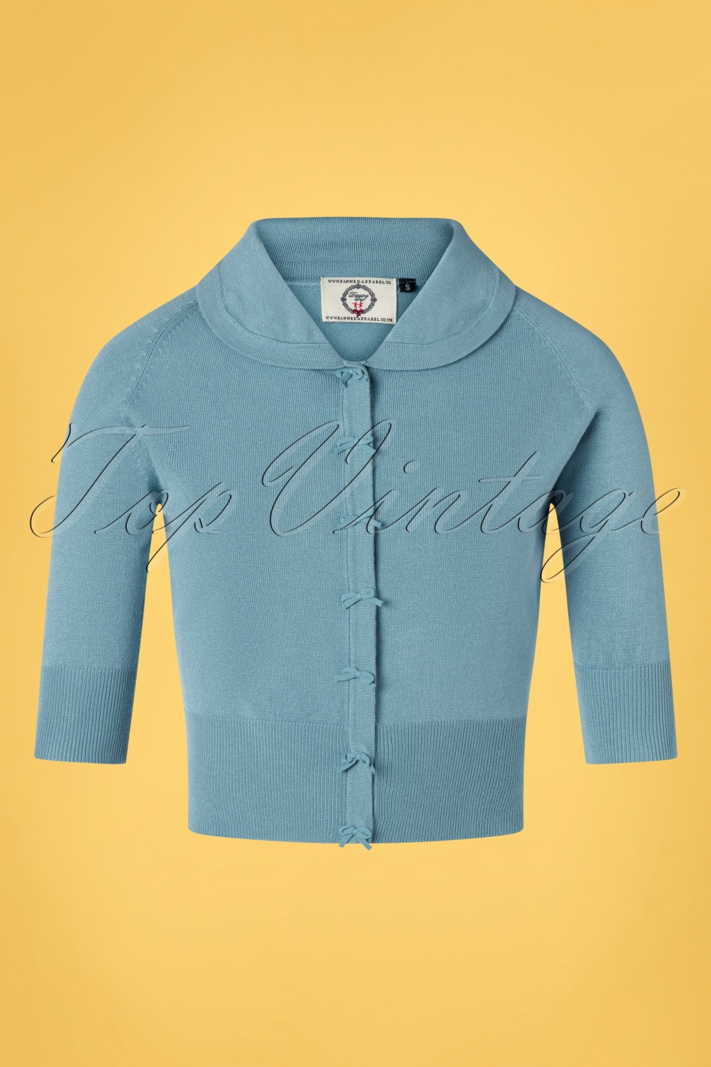 April vest met strik in babyblauw