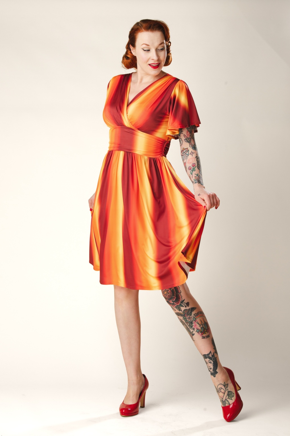 Topvintage exclusive ~ Sadie Faded Stripes swing jurk in oranje en geel